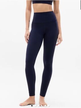 Athleta Salutation Stash Pocket II 7/8 Tight in Navy